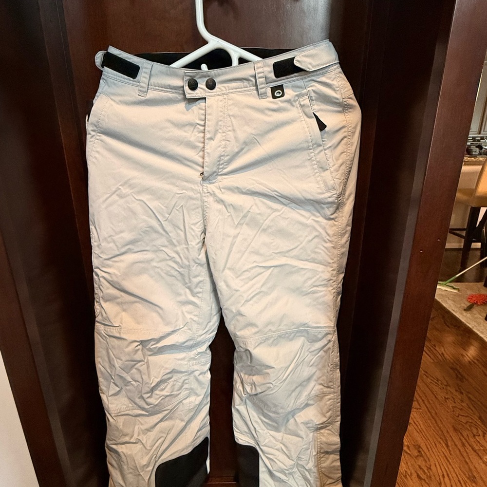 REI girls snow pants, size M (10–12).